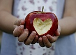 Girl_holding_heart_apple
