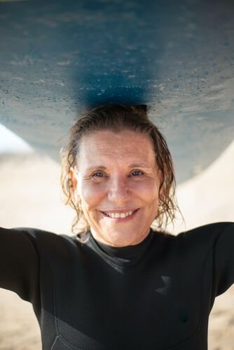 pexels-woman with surfboard